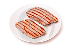 Yellowfin tuna fish steaks isolated on a white background