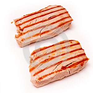 Yellowfin tuna fish steaks isolated on a white background