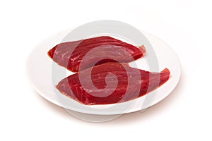 Yellowfin tuna fish steaks isolated on a white background