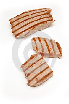 Yellowfin tuna fish steaks isolated on a white background