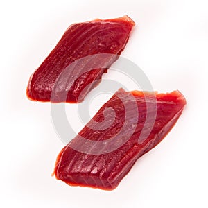 Yellowfin tuna fish steaks isolated on a white background