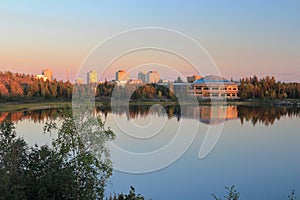 Yellowknife Skyline with Territorial Assembly Building reflected in Frame Lake in Evening Light, Northwest Territories, Canada