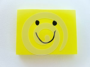 Happy expression. Simple yellow note
