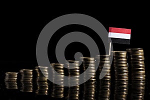 Yemeni flag with lot of coins on black