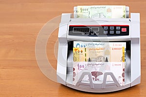 Yemeni rial in a counting machine
