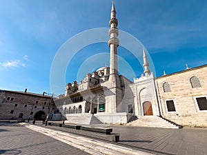 Yeni Cami (New Mosque) located in Eminonu, Istanbul on a sunny spring day photo