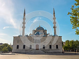 Yeni Cami (New Mosque) located in Eminonu, Istanbul on a sunny spring day photo