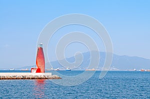 Red lighthouse at Yeosu expo port, South Korea photo