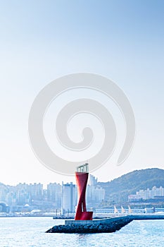 Red lighthouse at Yeosu expo port, South Korea photo