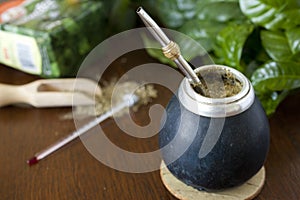 Yerba mate gourd and a bombilla. photo