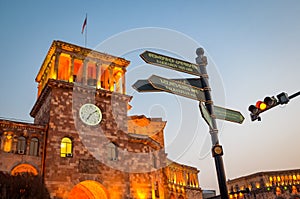 Yerevan city, Republic Square street signs and a clock tower at golden hour