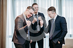 Yes business financial success happy men celebrate photo