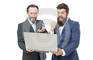 Yes we can. Happy businessmen work online. Bearded men use computer. Online marketing. Run business online. Access to