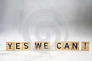 Yes we can text wooden cubes . Positive thinking, motivation, attitude and confidence concept. bright background texture