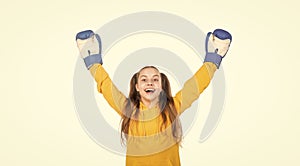 yes. knockout. happy kid celebrate victory. winner of fight. teen girl in boxing gloves.