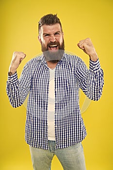 Yes. Mature happy man celebrate success. Summer hipster. Brutal bearded hipster in checkered shirt. Emotional man with