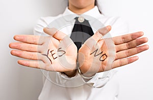 Yes or No? Words on businesswoman hands