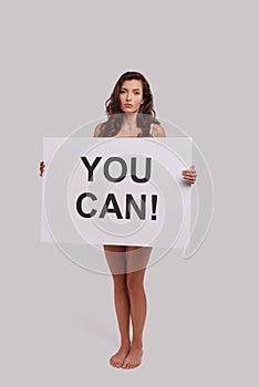 Yes you can! Full length of attractive young woman covering wit