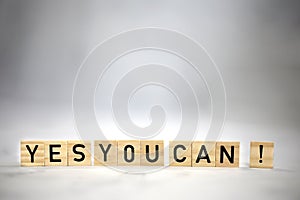 Yes you can text wooden cubes . Positive thinking, motivation, attitude and confidence concept. bright background