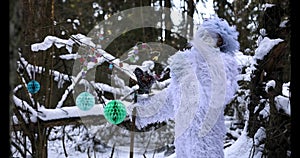 Yeti fairy tale character in winter forest. Outdoor fantasy 4K footage.