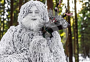 Yeti fairy tale character in winter forest. Outdoor fantasy photo.