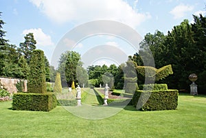 yew topiary garden with statues