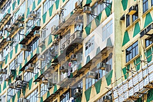 Yick Fat Building, Quarry Bay, Hong Kong. Residential area in an old apartment with windows