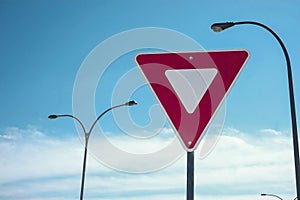 Yield road sign