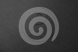 Yin and Yang Chinese philosophy balance symbol, black on black