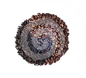 Yin yang symbol made with coffee beans. White background.