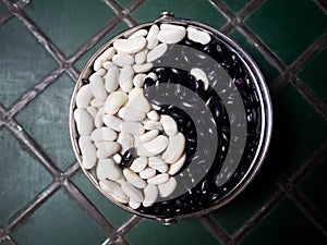 Ying Yang chinese philosophical simbol made of beans