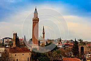 Yivli Minaret and roof-tops in old city of Antalya, Turkey.