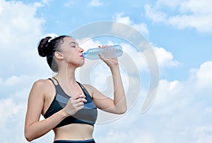 Yoga athlete woman drinking water after work out