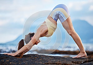Yoga, balance and outdoor exercise with woman doing pilates for wellness, body and mental health in city. Fitness female