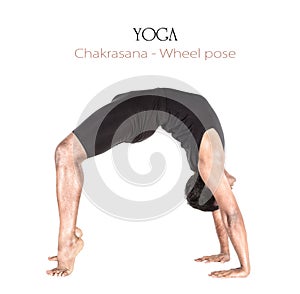 Yoga Chakrasana wheel pose photo