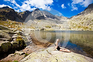 Yoga exercising in Tatry mountains