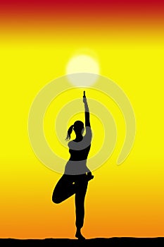Yoga female silhouette with a sunset on the background and copy space for your text