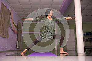 Yoga female working out in yoga in a studio