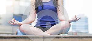 Yoga fitness lifestyle healthy woman relaxation doing a meditation. Yoga meditating outdoor with zen on sitting position. Young