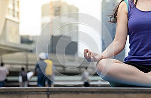 Yoga fitness lifestyle healthy woman relaxation doing a meditation. Yoga meditating outdoor with zen on sitting position. Young