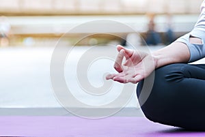 Yoga fitness lifestyle healthy woman relaxation doing a meditation. Yoga meditating outdoor with zen on sitting position. Young