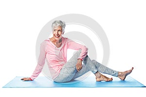 Yoga, fitness and senior woman in studio isolated on a white background. Zen chakra, pilates and retired, elderly and