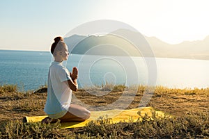 Yoga girl with wireless headphones