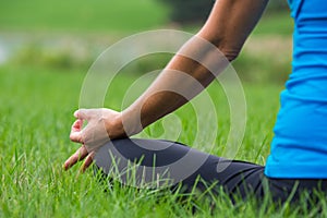 Yoga hand pose close-up female outdoor