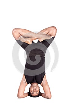 Yoga by Indian man on white