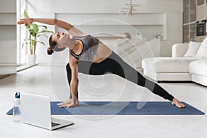 Yoga instructor conducting online virtual class