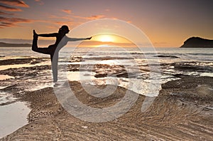 Yoga King Dancer Pose balance by the sea