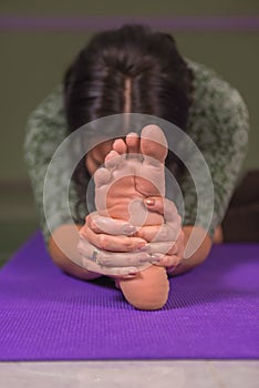 Yoga learner shows yoga exercises