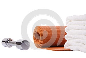 yoga mat, dumbbell, towel