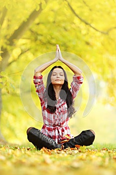 Yoga meditation in autumn